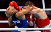 1 August 2021; Benjamin Whittaker of Great Britain, left, and Imam Khataev of Russian Olympic Committee during their men's light heavyweight semi-final bout at the Kokugikan Arena during the 2020 Tokyo Summer Olympic Games in Tokyo, Japan. Photo by Brendan Moran/Sportsfile