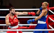1 August 2021; Benjamin Whittaker of Great Britain, left, and Imam Khataev of Russian Olympic Committee during their men's light heavyweight semi-final bout at the Kokugikan Arena during the 2020 Tokyo Summer Olympic Games in Tokyo, Japan. Photo by Brendan Moran/Sportsfile
