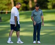 1 August 2021; Rory McIlroy of Ireland looks back on his missed putt on the 11th with Shane Lowry of Ireland during the bronze medal play-off in round 4 of the men's individual stroke play at the Kasumigaseki Country Club during the 2020 Tokyo Summer Olympic Games in Kawagoe, Saitama, Japan. Photo by Ramsey Cardy/Sportsfile
