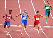 1 August 2021; Bingtan Su of China, second from right, wins the men's 100 metres semi-final final from second place, Ronnie Baker of the United States, left, and third place, Lamont Marcell Jacobs of Italy, second from left, at the Olympic Stadium on day nine of the 2020 Tokyo Summer Olympic Games in Tokyo, Japan. Photo by Brendan Moran/Sportsfile