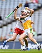 1 August 2021; Paddy Delaney of Offaly in action against Brian Cassidy of Derry during the Christy Ring Cup Final match between Derry and Offaly at Croke Park in Dublin. Photo by Piaras Ó Mídheach/Sportsfile
