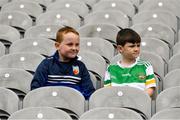 1 August 2021; Offaly supporters Darragh Mannion, 8, and Finn Kelly, 9, both from Tullamore, during the Christy Ring Cup Final match between Derry and Offaly at Croke Park in Dublin.  Photo by Ray McManus/Sportsfile