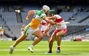 1 August 2021; Oisín Kelly of Offaly in action against Seán Cassidy of Derry during the Christy Ring Cup Final match between Derry and Offaly at Croke Park in Dublin. Photo by Ray McManus/Sportsfile