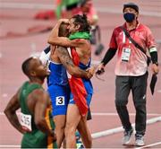 1 August 2021; Lamont Marcell Jacobs of Italy celebrates with Italy team-mate and Men's high jump final joint-first place winner Gianmarco Tamberi after winning the men's 100 metres final at the Olympic Stadium on day nine of the 2020 Tokyo Summer Olympic Games in Tokyo, Japan. Photo by Ramsey Cardy/Sportsfile