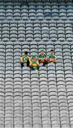 1 August 2021; Offaly supporters, left to right, Seán Hassett, Ronan McNamara, Gearóid McCormack and Cian Burke applaud a score from their seats in the Cusack stand as they watch the Christy Ring Cup Final match between Derry and Offaly at Croke Park in Dublin. Photo by Ray McManus/Sportsfile
