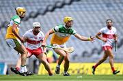 1 August 2021; Killian Sampson of Offaly gathers possession ahead of Odhran McKeever of Derry during the Christy Ring Cup Final match between Derry and Offaly at Croke Park in Dublin. Photo by Piaras Ó Mídheach/Sportsfile
