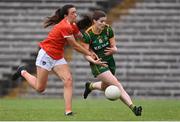 1 August 2021; Bridgetta Lynch of Meath is tackled by Tiarna Grimes of Armagh during the TG4 Ladies Football All-Ireland Championship Quarter-Final match between Armagh and Meath at St Tiernach's Park in Clones, Monaghan. Photo by Sam Barnes/Sportsfile