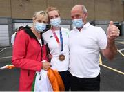 1 August 2021; Bronze medallist Emily Hegarty with mother Mary and father Gerry at Dublin Airport as Team Ireland's rowers return from the Tokyo 2020 Olympic Games. Photo by David Fitzgerald/Sportsfile