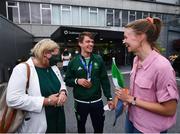 1 August 2021; Gold medallist Fintan McCarthy with chief executive of Rowing Ireland Michelle Carpenter, left, and Claire Lambe at Dublin Airport as Team Ireland's rowers return from the Tokyo 2020 Olympic Games. Photo by David Fitzgerald/Sportsfile