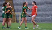 1 August 2021; Aimee Mackin of Armagh, right, and Aoibhín Cleary of Meath shake hands as Meath players celebrate after the TG4 Ladies Football All-Ireland Championship Quarter-Final match between Armagh and Meath at St Tiernach's Park in Clones, Monaghan. Photo by Sam Barnes/Sportsfile