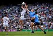 1 August 2021; Mick O'Grady of Kildare catches the ball ahead of Con O'Callaghan and James McCarthy, 5, of Dublin during the Leinster GAA Football Senior Championship Final match between Dublin and Kildare at Croke Park in Dublin. Photo by Ray McManus/Sportsfile