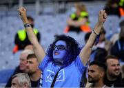 1 August 2021; A Dublin supporter in the Hogan Stand watches the last few minutes of the Leinster GAA Football Senior Championship Final match between Dublin and Kildare at Croke Park in Dublin. Photo by Ray McManus/Sportsfile