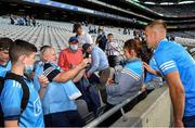 1 August 2021; Mick Johnson from Firhouse, Dublin takes a picture of Dublin captain Jonny Cooper with his daughter Hannah after the Leinster GAA Football Senior Championship Final match between Dublin and Kildare at Croke Park in Dublin. Photo by Ray McManus/Sportsfile