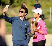 1 August 2021; Niall Horan of Modest Golf poses for a selfie with the Ladies winner Pajaree Anannarukarn of Thailand after Day Four of The ISPS HANDA World Invitational at Galgorm Spa & Golf Resort in Ballymena, Antrim. Photo by John Dickson/Sportsfile