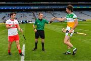 1 August 2021; Referee Thomas Gleeson with the two captains, Ben Conneely of Offaly and Cormac O'Doherty of Derry before the Christy Ring Cup Final match between Derry and Offaly at Croke Park in Dublin.  Photo by Ray McManus/Sportsfile