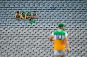 1 August 2021; Offaly supporters, left to right, Seán Hassett, Ronan McNamara, Gearóid McCormack and Cian Burke relax in the Cusack stand as they watch the Christy Ring Cup Final match between Derry and Offaly at Croke Park in Dublin.  Photo by Ray McManus/Sportsfile