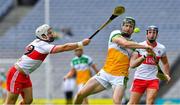 1 August 2021; Leon Fox of Offaly in action against Cormac O'Doherty of Derry during the Christy Ring Cup Final match between Derry and Offaly at Croke Park in Dublin.  Photo by Ray McManus/Sportsfile