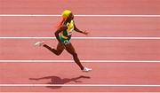 2 August 2021; Shelly-Ann Fraser-Pryce of Jamaica on her way to winning her heat of the women's 200 metre heats at the Olympic Stadium on day ten of the 2020 Tokyo Summer Olympic Games in Tokyo, Japan. Photo by Ramsey Cardy/Sportsfile