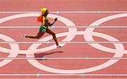 2 August 2021; Shelly-Ann Fraser-Pryce of Jamaica on her way to winning her heat of the women's 200 metre heats at the Olympic Stadium on day ten of the 2020 Tokyo Summer Olympic Games in Tokyo, Japan. Photo by Ramsey Cardy/Sportsfile