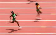 2 August 2021; Marie-Josee Ta Lou of Côte d'Ivoire, right, on her way to winning her heat of the women's 200 metre heats, ahead of Nzubechi Grace Nwokocha of Nigeria, at the Olympic Stadium on day ten of the 2020 Tokyo Summer Olympic Games in Tokyo, Japan. Photo by Ramsey Cardy/Sportsfile