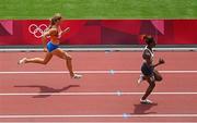 2 August 2021; Dafne Schippers of Netherlands, left, and Beatrice Masilingi of Namibia in action during the women's 200 metre heats at the Olympic Stadium on day ten of the 2020 Tokyo Summer Olympic Games in Tokyo, Japan. Photo by Ramsey Cardy/Sportsfile