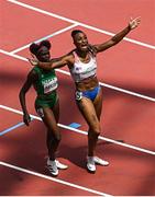 2 August 2021; Jasmine Camacho-Quinn of Puerto Rico celebrates after winning the women's 100 metre hurdles final alongside 4th place Tobi Amusan of Nigeria at the Olympic Stadium on day ten of the 2020 Tokyo Summer Olympic Games in Tokyo, Japan. Photo by Ramsey Cardy/Sportsfile