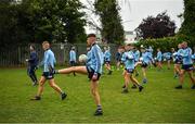 2 August 2021; Dublin players warm up on the back pitch before the 2021 Electric Ireland Leinster Minor Football Championship Final match between Meath and Dublin at Bord Na Mona O'Connor Park in Tullamore, Offaly. Photo by Ray McManus/Sportsfile
