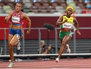 2 August 2021; Shelly-Ann Fraser-Pryce of Jamaica, right, on her way to winning her semi-final of the women's 200 metres ahead of eventual fifth place Jenna Prandini of USA at the Olympic Stadium on day ten of the 2020 Tokyo Summer Olympic Games in Tokyo, Japan. Photo by Ramsey Cardy/Sportsfile