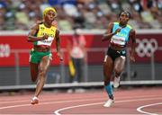 2 August 2021; Shelly-Ann Fraser-Pryce of Jamaica, left, on her way to winning her semi-final of the women's 200 metres ahead of eventual third place Anthonique Strachan of Bahamas at the Olympic Stadium on day ten of the 2020 Tokyo Summer Olympic Games in Tokyo, Japan. Photo by Ramsey Cardy/Sportsfile