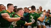 2 August 2021; Meath players celebrate as their captain Liam Kelly arrives with the cup after the 2021 Electric Ireland Leinster Minor Football Championship Final match between Meath and Dublin at Bord Na Mona O'Connor Park in Tullamore, Offaly. Photo by Ray McManus/Sportsfile