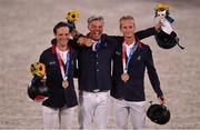 2 August 2021; Team France members, from left, Nicolas Touzaint, Karim Florent Laghouag and Cristopher Six celebrate with their bronze medals after winning the eventing jumping individual final at the Equestrian Park during the 2020 Tokyo Summer Olympic Games in Tokyo, Japan. Photo by Brendan Moran/Sportsfile