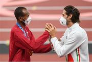 2 August 2021; Joint gold medalists Mutaz Essa Barshim of Qatar, left, and Gianmarco Tamberi of Italy during the Men's High Jump Victory Ceremony at the Olympic Stadium on day ten of the 2020 Tokyo Summer Olympic Games in Tokyo, Japan. Photo by Ramsey Cardy/Sportsfile