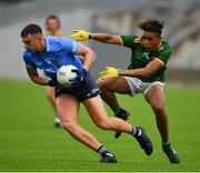 2 August 2021; Ciarán Duggan of Dublin in action against Sean Emmanuel of Meath during the 2021 Electric Ireland Leinster Minor Football Championship Final match between Meath and Dublin at Bord Na Mona O'Connor Park in Tullamore, Offaly. Photo by Ray McManus/Sportsfile
