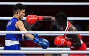 3 August 2021; Yuberjen Herney Martinez Rivas of Colombia, right, and Ryomei Tanaka of Japan during their men's flyweight quarter-final bout at the Kokugikan Arena during the 2020 Tokyo Summer Olympic Games in Tokyo, Japan. Photo by Brendan Moran/Sportsfile