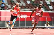 3 August 2021; Ramil Guliyev of Turkey, left, and Femi Ogunode of Qatar in action during the men's 200 metre heats at the Olympic Stadium during the 2020 Tokyo Summer Olympic Games in Tokyo, Japan. Photo by Ramsey Cardy/Sportsfile