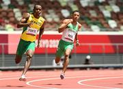 3 August 2021; Leon Reid of Ireland, right, and Julian Forte of Jamaica in action during the men's 200 metre heats at the Olympic Stadium during the 2020 Tokyo Summer Olympic Games in Tokyo, Japan. Photo by Ramsey Cardy/Sportsfile