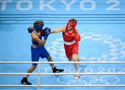 3 August 2021; Kellie Harrington of Ireland, right, and Imane Khelif of Algeria during their women's lightweight quarter-final bout at the Kokugikan Arena during the 2020 Tokyo Summer Olympic Games in Tokyo, Japan. Photo by Stephen McCarthy/Sportsfile