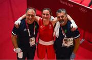 3 August 2021; Kellie Harrington of Ireland with coaches John Conlan, right, and Zaur Antia after her victory in the women's lightweight quarter-final bout against Imane Khelif of Algeria at the Kokugikan Arena during the 2020 Tokyo Summer Olympic Games in Tokyo, Japan. Photo by Brendan Moran/Sportsfile