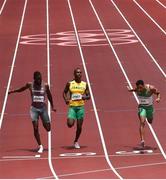 3 August 2021; Leon Reid of Ireland, right, and Julian Forte of Jamaica, centre, and Brandon Rodney of Canada cross the line in the men's 200 metre heats at the Olympic Stadium during the 2020 Tokyo Summer Olympic Games in Tokyo, Japan. Photo by Ramsey Cardy/Sportsfile