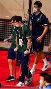 3 August 2021; Aidan Walsh of Ireland arrives on crutches with his foot and knee injury, alsongside High performance director Bernard Dunne prior to the boxing medal presentation at the Kokugikan Arena during the 2020 Tokyo Summer Olympic Games in Tokyo, Japan. Photo by Brendan Moran/Sportsfile