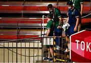 3 August 2021; Aidan Walsh of Ireland arrives on crutches with his foot and knee injury prior to the boxing medal presentation at the Kokugikan Arena during the 2020 Tokyo Summer Olympic Games in Tokyo, Japan. Photo by Brendan Moran/Sportsfile