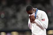 3 August 2021; Rai Benjamin of the United States kisses his silver medal during the medals ceremony for the men's 400m hurdles at the Olympic Stadium during the 2020 Tokyo Summer Olympic Games in Tokyo, Japan. Photo by Ramsey Cardy/Sportsfile