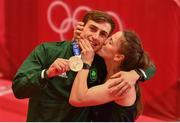 3 August 2021; Michaela Walsh of Ireland kisses her brother Aidan Walsh of Ireland with his bronze medal that he won in the men's welterweight division at the Kokugikan Arena during the 2020 Tokyo Summer Olympic Games in Tokyo, Japan. Photo by Brendan Moran/Sportsfile