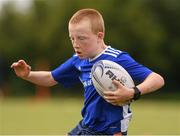 3 August 2021; Thomas Gahan, age 10, in action during the Bank of Ireland Leinster Rugby Summer Camp at Enniscorthy RFC in Enniscorthy, Wexford. Photo by Matt Browne/Sportsfile