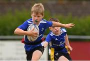 3 August 2021; Mark Ashmore, age 9, in action during the Bank of Ireland Leinster Rugby Summer Camp at Enniscorthy RFC in Enniscorthy, Wexford. Photo by Matt Browne/Sportsfile