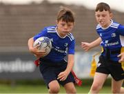 3 August 2021; Finn Cullen, age 9, in action during the Bank of Ireland Leinster Rugby Summer Camp at Enniscorthy RFC in Enniscorthy, Wexford. Photo by Matt Browne/Sportsfile
