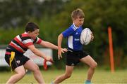 3 August 2021; Mikey Kennedy, age 9, in action during the Bank of Ireland Leinster Rugby Summer Camp at Enniscorthy RFC in Enniscorthy, Wexford. Photo by Matt Browne/Sportsfile