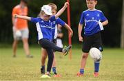 3 August 2021; Alex Brooks, age 6, in action during the Bank of Ireland Leinster Rugby Summer Camp at Enniscorthy RFC in Enniscorthy, Wexford. Photo by Matt Browne/Sportsfile