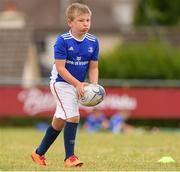 3 August 2021; Liam Corrigan, age 7, in action during the Bank of Ireland Leinster Rugby Summer Camp at Enniscorthy RFC in Enniscorthy, Wexford. Photo by Matt Browne/Sportsfile