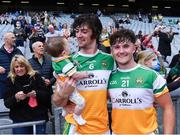 1 August 2021; Offaly captain Ben Conneely with his daughter Liadán, 8 months, and team-mate Luke O'Connor after the Christy Ring Cup Final match between Derry and Offaly at Croke Park in Dublin. Photo by Piaras Ó Mídheach/Sportsfile